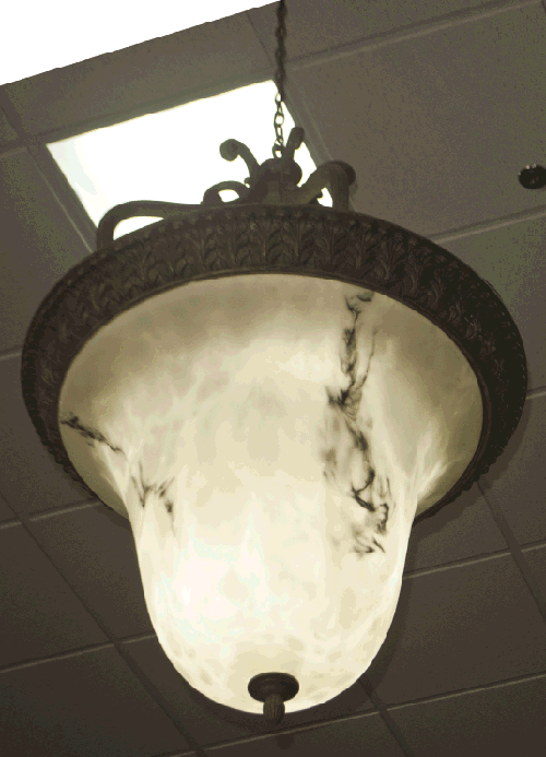 The antique chandeliers that light the new showroom