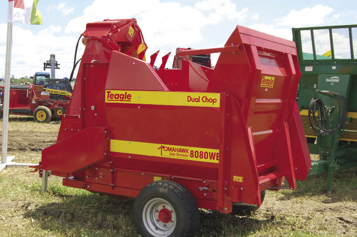 Tomahawk straw spreader and silage feeder