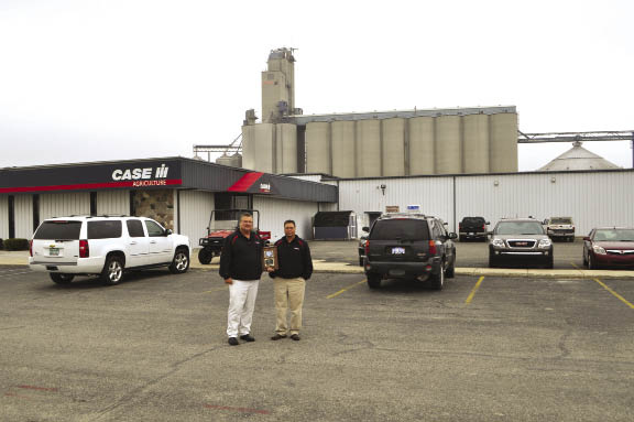 With a grain elevator as the backdrop of their Breckenridge, Mich., store, Tom and Steve Janson say receiving the 2011 Farm Equipment Dealership of the Year award is really a tribute to Janson Equipment employees at all three of its locations. With a grain elevator as the backdrop of their Breckenridge, Mich., store, Tom and Steve Janson say receiving the 2011 Farm Equipment Dealership of the Year award is really a tribute to Janson Equipment employees at all three of its locations.