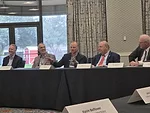 Titan Machinery's BJ Knutson moderates a panel on policy during the AED Summit.