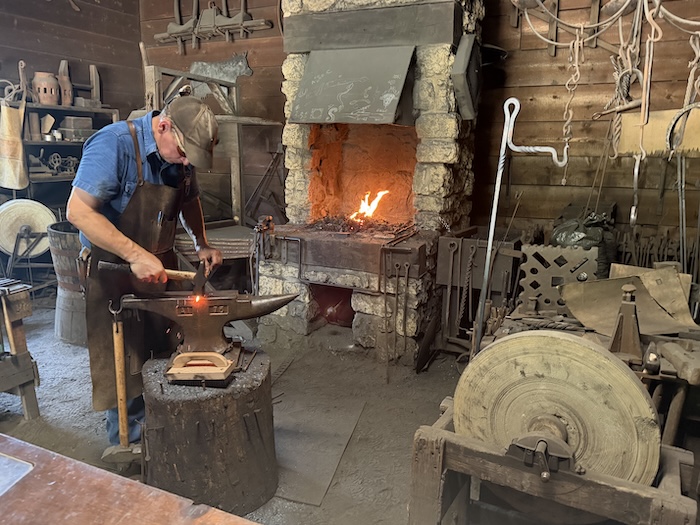Blacksmith at John Deere's forge
