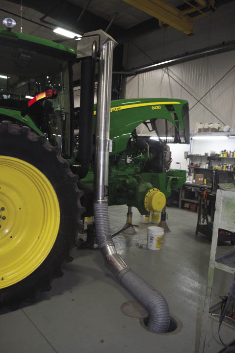 Hiawatha Implement devised an exhaust system for the service department that runs through the floor as opposed to being hung from the ceiling.