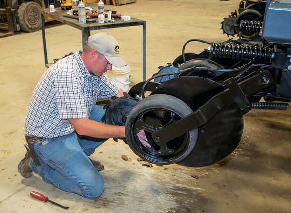 Derek Shireman handles the bulk of the service work at Z&J Farm Equipment. So far, all the work is mechanical.