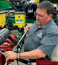 Ag-Careers-Special-Report_Jack-Installing.jpg