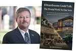 John-Schmeiser-with-book.jpg