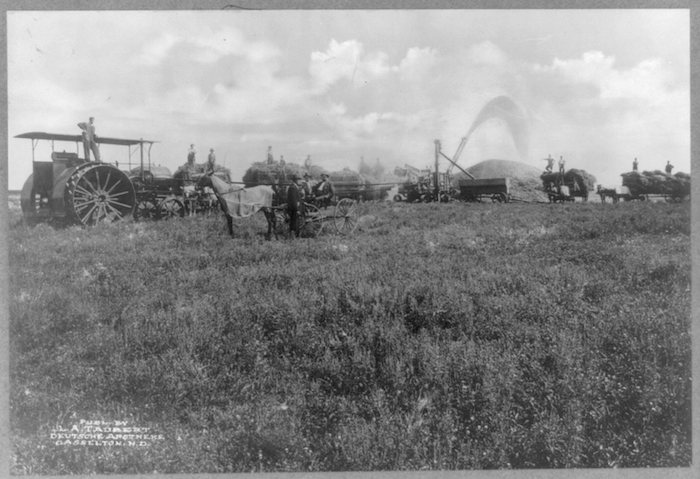 Early twentieth-century threshing scene in North Dakota