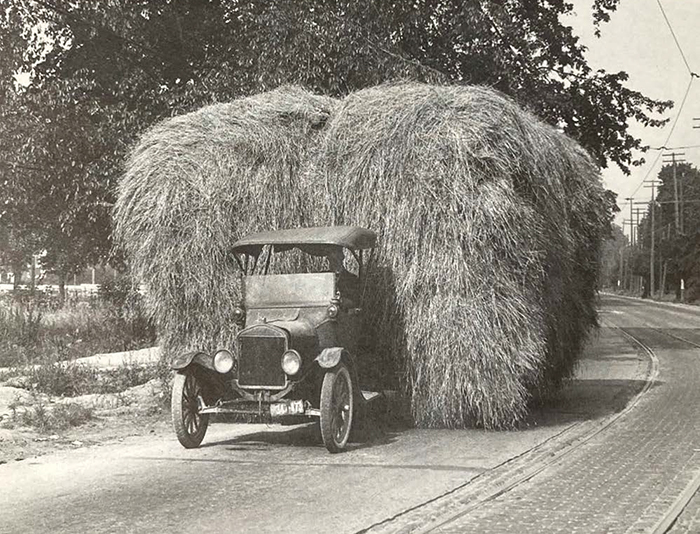 Ford family hauling hay